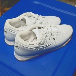 White pair of Fila shoes